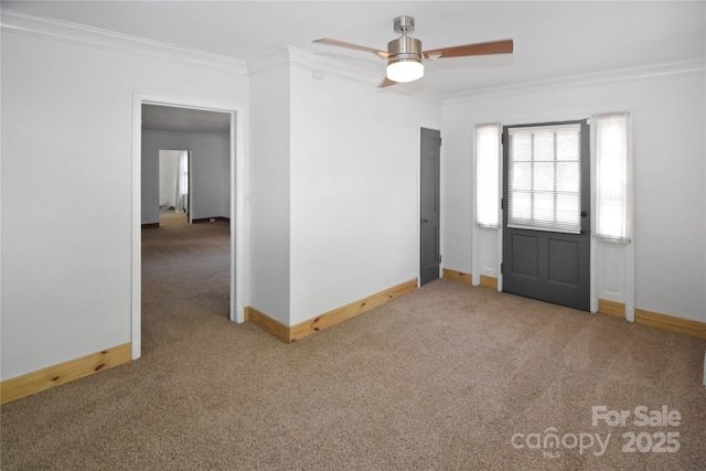1101 Pee Dee Ave, Albemarle, NC 28001 - entrance foyer featuring carpet, baseboards, ornamental molding, and ceiling fan