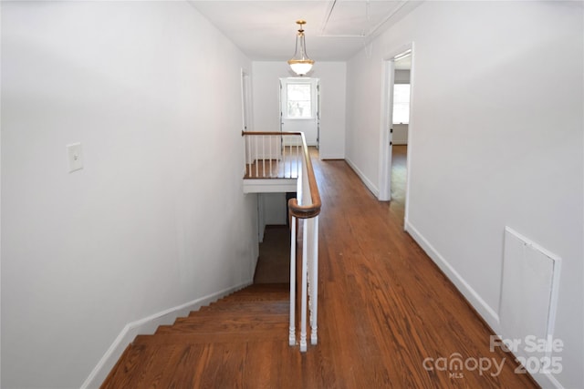1101 Pee Dee Ave, Albemarle, NC 28001 - hallway featuring attic access, an upstairs landing, wood finished floors, and baseboards
