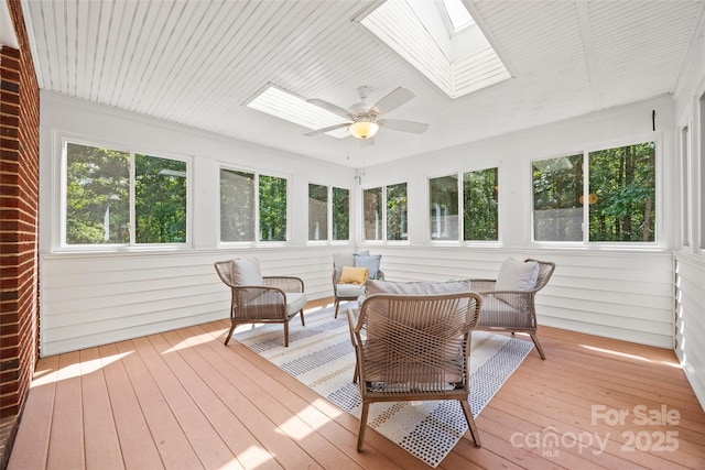 7103 Forest Ridge Rd, Matthews, NC 28104 - sunroom / solarium featuring a skylight, outdoor lounge area, and a ceiling fan