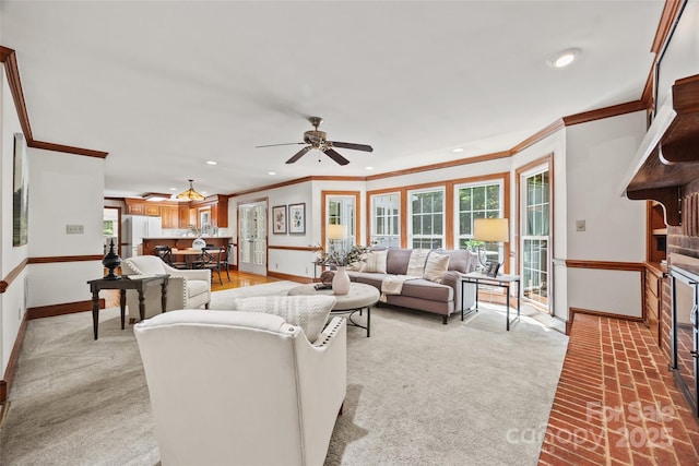 7103 Forest Ridge Rd, Matthews, NC 28104 - living area with baseboards, crown molding, light colored carpet, ceiling fan, and recessed lighting
