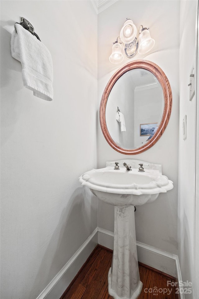7103 Forest Ridge Rd, Matthews, NC 28104 - bathroom with baseboards, crown molding, and wood finished floors