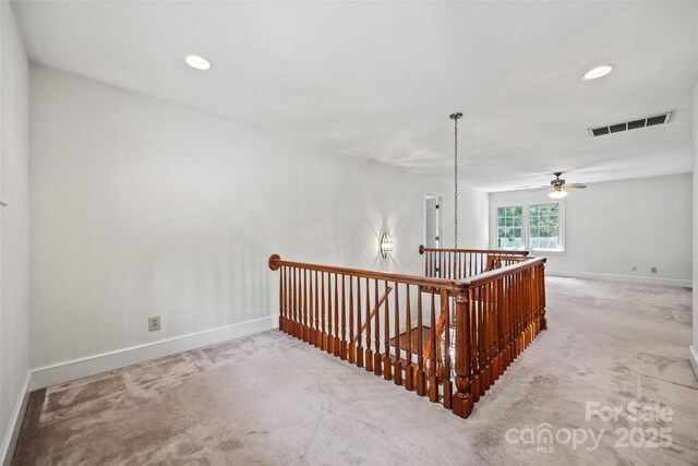 7103 Forest Ridge Rd, Matthews, NC 28104 - staircase featuring carpet flooring, baseboards, recessed lighting, and a ceiling fan