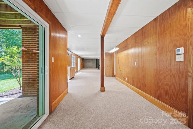 7103 Forest Ridge Rd, Matthews, NC 28104 - corridor with carpet, wood walls, and baseboards