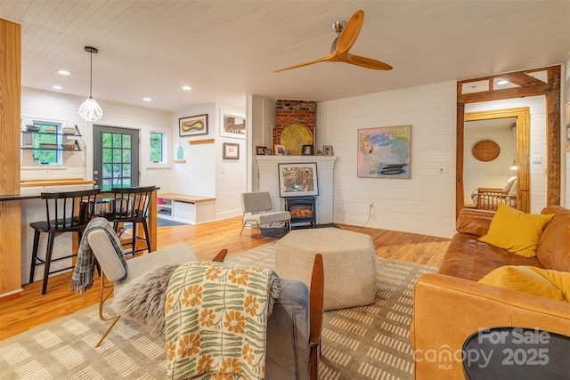 564 Jupiter Rd, Weaverville, NC 28787 - living area with wood finished floors, a ceiling fan, wooden walls, and recessed lighting