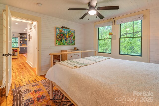 564 Jupiter Rd, Weaverville, NC 28787 - bedroom with light wood finished floors, a ceiling fan, and recessed lighting