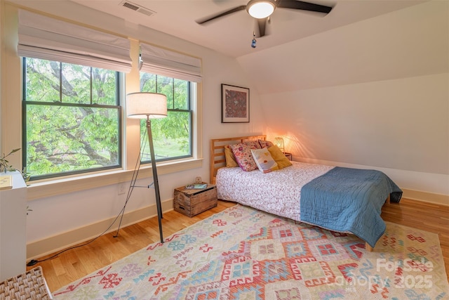 564 Jupiter Rd, Weaverville, NC 28787 - bedroom featuring wood finished floors, baseboards, a ceiling fan, and vaulted ceiling