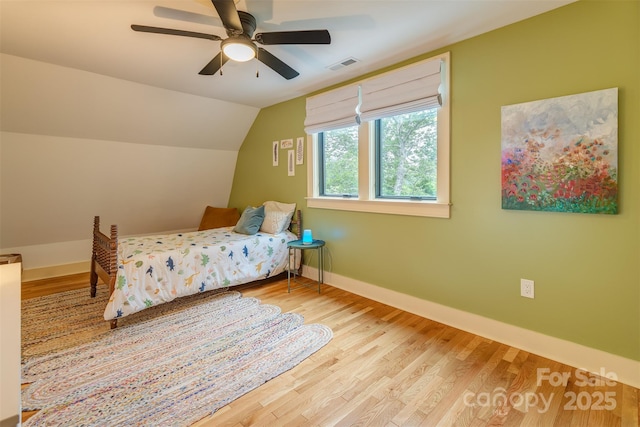 564 Jupiter Rd, Weaverville, NC 28787 - bedroom featuring wood finished floors, baseboards, vaulted ceiling, and a ceiling fan