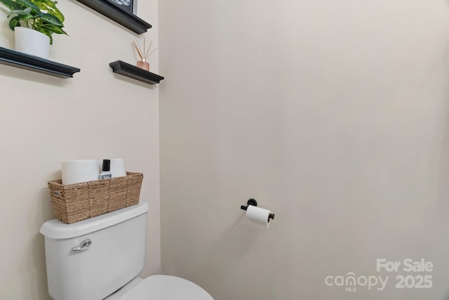 bathroom featuring toilet
