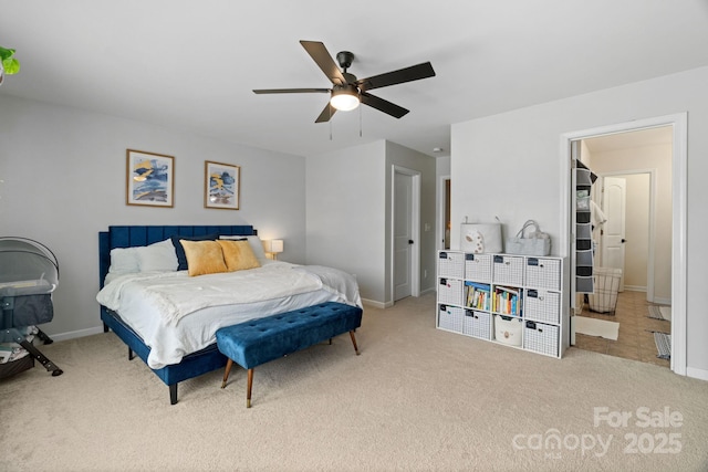 bedroom featuring carpet, baseboards, and ceiling fan