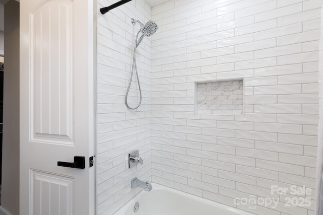 bathroom with shower / tub combination