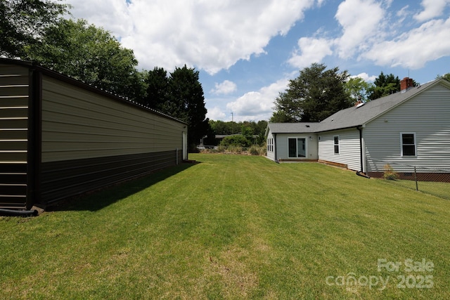 view of yard featuring fence