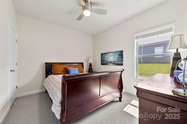 5727 Lavaux Ct, Charlotte, NC 28214 - bedroom featuring light colored carpet, baseboards, and ceiling fan