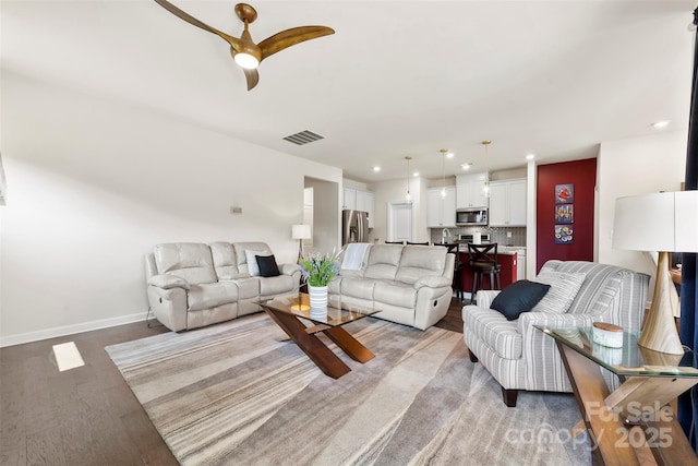 5727 Lavaux Ct, Charlotte, NC 28214 - living area featuring light wood-type flooring, ceiling fan, baseboards, and recessed lighting