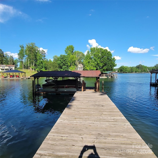221 Stillwater Rd, Troutman, NC 28166 - dock with a water view and boat lift