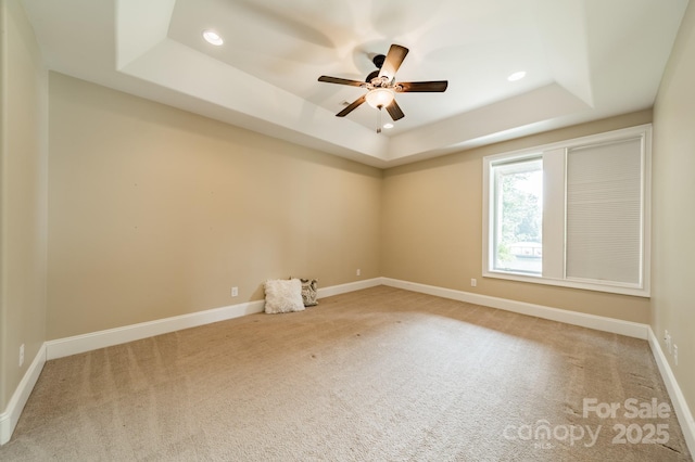 221 Stillwater Rd, Troutman, NC 28166 - carpeted spare room with a tray ceiling, recessed lighting, and a ceiling fan