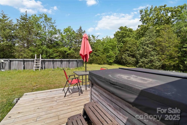 deck with a hot tub