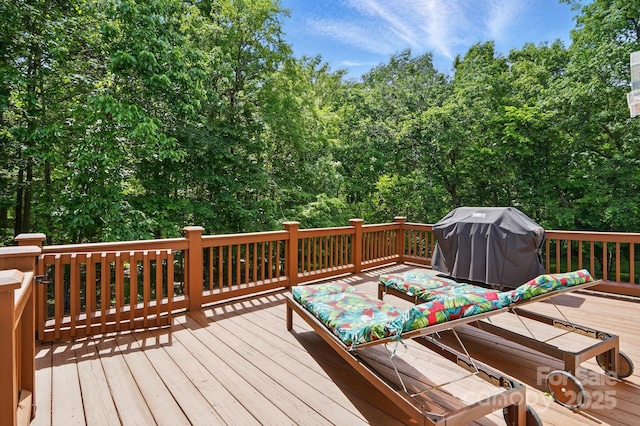 wooden deck with area for grilling