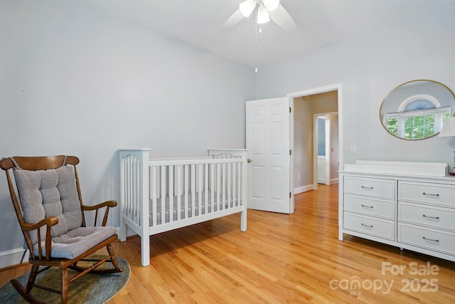 bedroom with light wood-style flooring