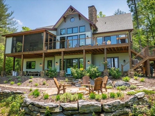2054 Catawba Trl Unit 162, Nebo, NC 28761 - rear view of house featuring a sunroom, stairs, a chimney, and a deck