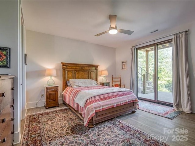 2054 Catawba Trl Unit 162, Nebo, NC 28761 - bedroom featuring access to outside, wood finished floors, ceiling fan, and baseboards
