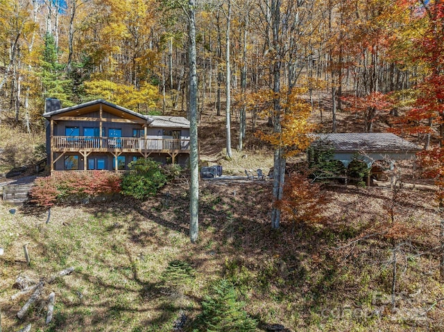 466 Hanging Rock Rd, Mars Hill, NC 28754 - view of yard featuring a wooden deck and a forest view