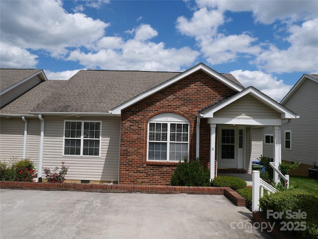 37 S Woodridge View Ct, Hendersonville, NC 28791 - view of front of property with a shingled roof, brick siding, and covered porch