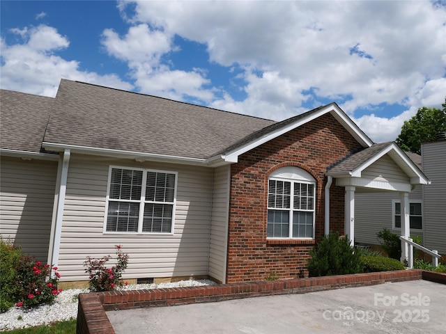 37 S Woodridge View Ct, Hendersonville, NC 28791 - view of front of house with brick siding and roof with shingles