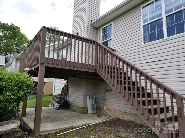 37 S Woodridge View Ct, Hendersonville, NC 28791 - rear view of house featuring a patio area, a chimney, and a wooden deck