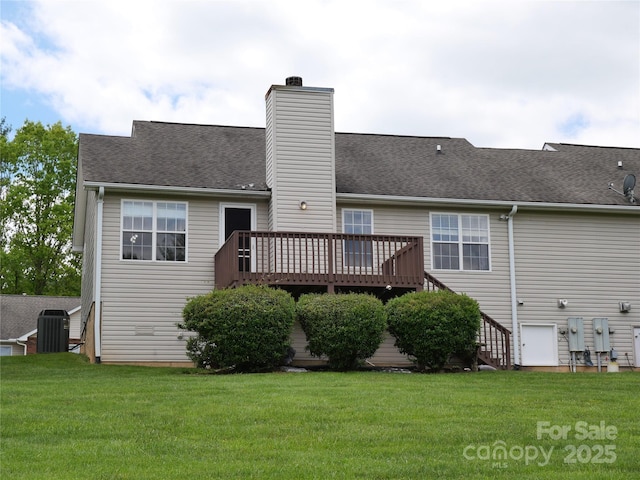 37 S Woodridge View Ct, Hendersonville, NC 28791 - rear view of property featuring a wooden deck, a lawn, a chimney, and central air condition unit