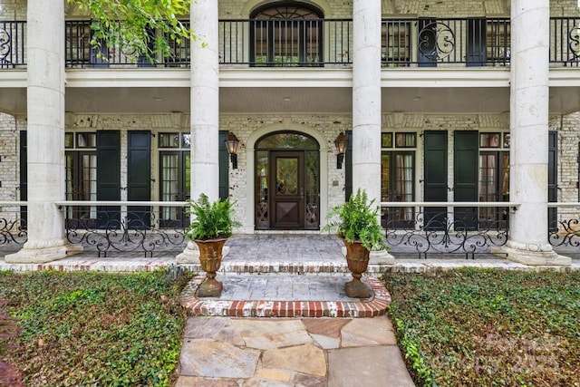4523 Fox Brook Ln, Charlotte, NC 28211 - property entrance featuring a balcony, french doors, and a porch