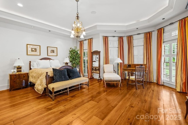 4523 Fox Brook Ln, Charlotte, NC 28211 - bedroom featuring a tray ceiling, light wood-style floors, a chandelier, crown molding, and recessed lighting