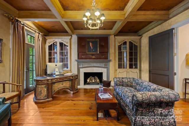 4523 Fox Brook Ln, Charlotte, NC 28211 - living area with coffered ceiling, crown molding, wood-type flooring, healthy amount of natural light, and a chandelier