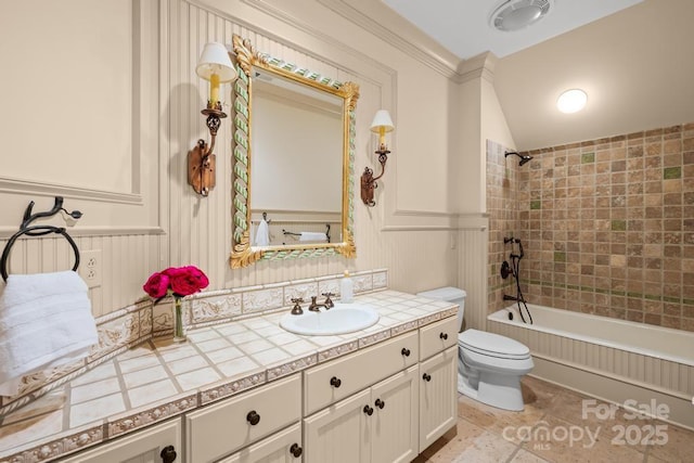 4523 Fox Brook Ln, Charlotte, NC 28211 - full bath featuring tub / shower combination, toilet, vanity, a wainscoted wall, and crown molding