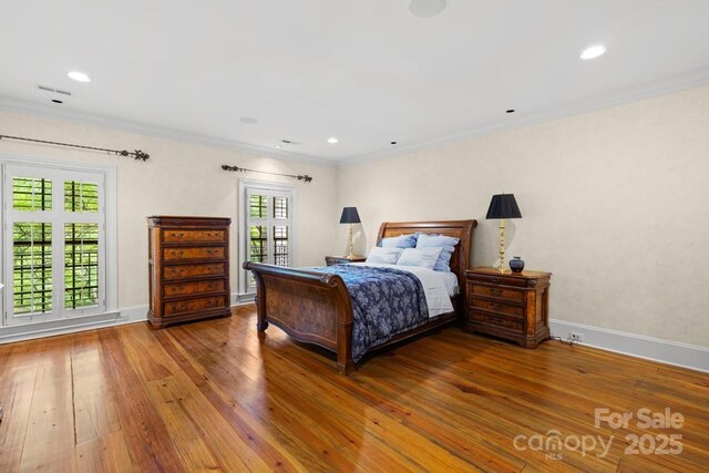 4523 Fox Brook Ln, Charlotte, NC 28211 - bedroom with wood-type flooring, baseboards, crown molding, and recessed lighting