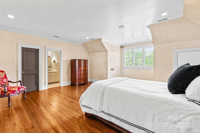 4523 Fox Brook Ln, Charlotte, NC 28211 - bedroom with crown molding, wood finished floors, recessed lighting, baseboards, and ensuite bath