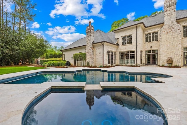 4523 Fox Brook Ln, Charlotte, NC 28211 - swimming pool featuring an in-ground hot tub and a patio