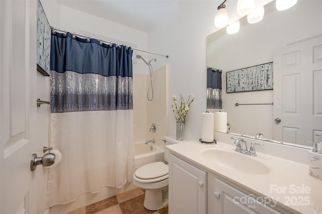 full bathroom featuring shower / tub combo with curtain, toilet, and vanity