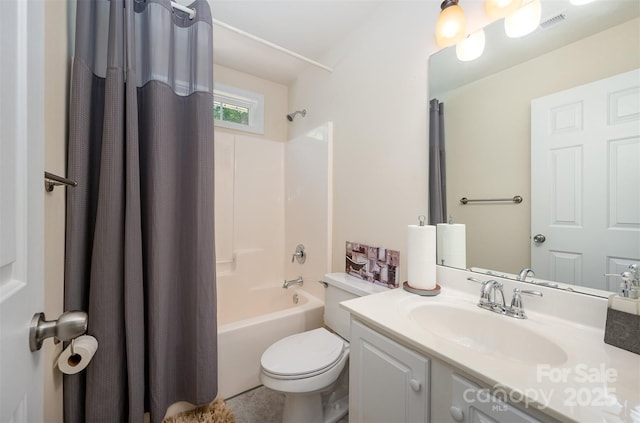 bathroom featuring toilet, vanity, and shower / bath combination with curtain