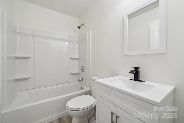 1417 W Monroe St, Salisbury, NC 28144 - full bath featuring toilet, vanity, wood finished floors, and bathing tub / shower combination