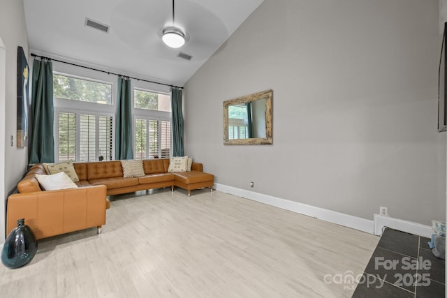 222 Riverview Ter, Clover, SC 29710 - living area with wood finished floors, baseboards, and high vaulted ceiling