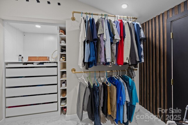 222 Riverview Ter, Clover, SC 29710 - walk in closet featuring radiator and marble look tiles