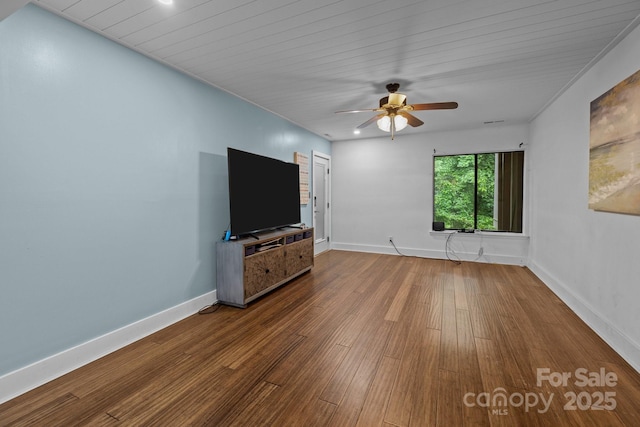 222 Riverview Ter, Clover, SC 29710 - unfurnished living room featuring wood finished floors, baseboards, and ceiling fan