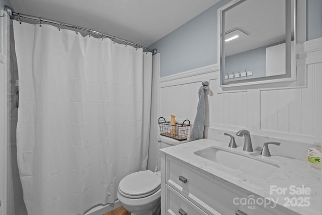 222 Riverview Ter, Clover, SC 29710 - bathroom with toilet, vanity, and a shower with shower curtain