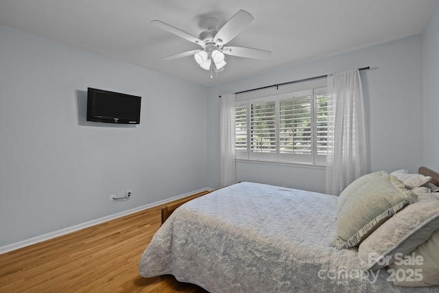 222 Riverview Ter, Clover, SC 29710 - bedroom with wood finished floors, baseboards, and ceiling fan