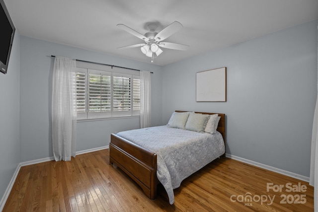 222 Riverview Ter, Clover, SC 29710 - bedroom featuring hardwood / wood-style floors, baseboards, and a ceiling fan