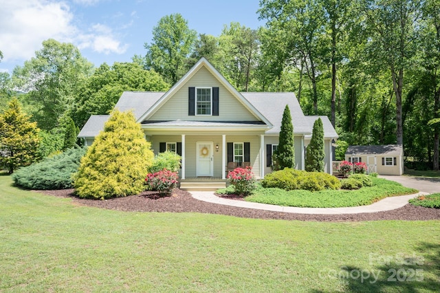 19 Lynnbrook Way, Columbus, NC 28722 - view of front facade featuring a porch, a front yard, and an outbuilding