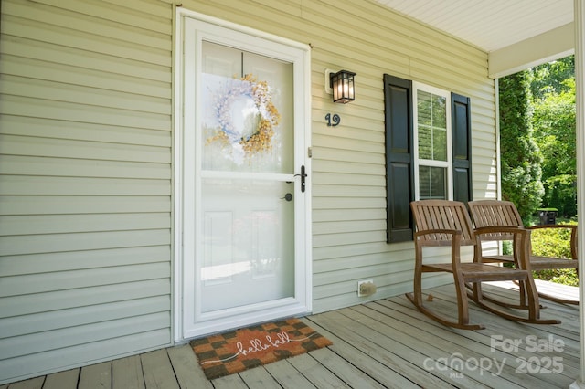 19 Lynnbrook Way, Columbus, NC 28722 - view of exterior entry featuring a porch