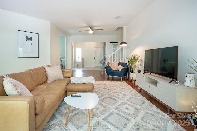 19 Lynnbrook Way, Columbus, NC 28722 - living area with wood finished floors, a ceiling fan, and stairs