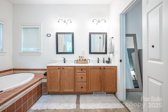 19 Lynnbrook Way, Columbus, NC 28722 - bathroom featuring a garden tub and double vanity