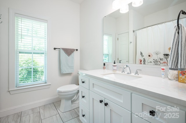 19 Lynnbrook Way, Columbus, NC 28722 - full bath with toilet, vanity, marble finish flooring, and baseboards